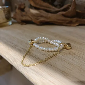 Pietų Korėjos naujo dizaino bižuterijos rankomis austi gėlavandenių perlų kūrybos vieną ne pradurtas ausis kaulų įrašą moterų auskarai